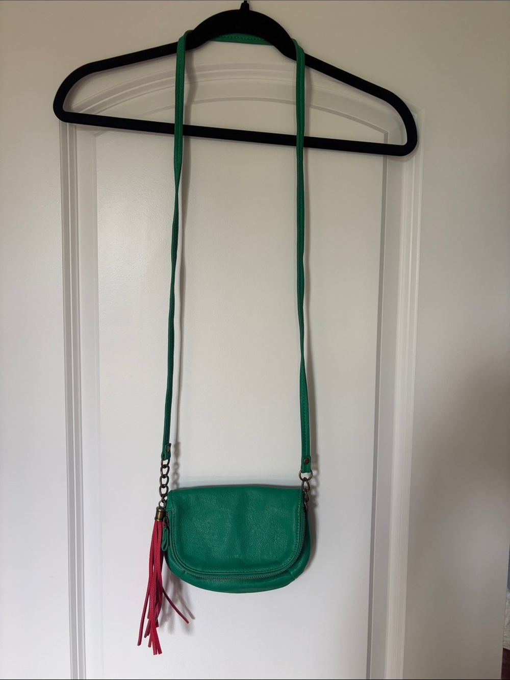 Ecote Green Crossbody Bag with Red Tassel Accent